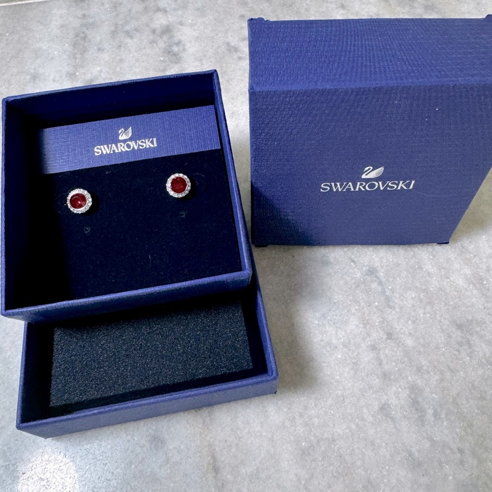1 pair of Swarovski earrings in original box- never worn
